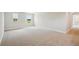 Spacious bedroom featuring neutral carpet, fresh paint, and bright windows at 12758 Oak Hill Way, Parrish, FL 34219
