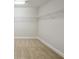 Walk-in closet with wire shelving, perfect for ample storage at 12758 Oak Hill Way, Parrish, FL 34219