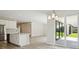 Living room with an island, stainless appliances, and lots of natural light at 12758 Oak Hill Way, Parrish, FL 34219
