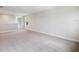 Spacious living room featuring neutral carpet and fresh paint at 12758 Oak Hill Way, Parrish, FL 34219