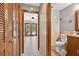 Powder room featuring elegant vanity and fixtures at 1357 Dinsmore Ct, New Port Richey, FL 34655