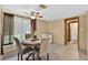 Charming breakfast nook features a round table, seating for four and lots of natural light at 1357 Dinsmore Ct, New Port Richey, FL 34655