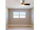 Bright bedroom with natural light, ceiling fan, and neutral walls at 140 88Th Ne Ave, St Petersburg, FL 33702