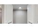 Spacious closet with ample storage, featuring white doors and hardware, ready for organization at 140 88Th Ne Ave, St Petersburg, FL 33702