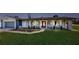 Charming single Gathering home featuring a lovely front yard and an arched walkway at 140 88Th Ne Ave, St Petersburg, FL 33702