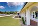 Home exterior showcasing brick columns and an arched walkway leading to the front door at 140 88Th Ne Ave, St Petersburg, FL 33702