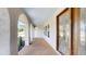 Close-up of the decorative glass front door and arched walkway of the home at 140 88Th Ne Ave, St Petersburg, FL 33702