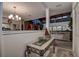 Open entryway featuring stylish decor and seamless transition to the living room and kitchen at 140 Dale Pl, Oldsmar, FL 34677