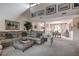 Open-concept living room featuring comfortable seating, a dining area, and a stylish decor at 140 Dale Pl, Oldsmar, FL 34677