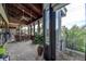 Bright sunroom featuring a wood ceiling, lots of windows, tile floors, and a dining set at 140 Dale Pl, Oldsmar, FL 34677