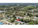 Aerial view of the home's location with proximity to a body of water and lush surroundings at 1743 Fulton Ave, Clearwater, FL 33755