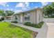 Attractive home with fresh landscaping and a welcoming entrance at 1743 Fulton Ave, Clearwater, FL 33755