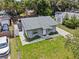 Charming single-story home with a well-manicured lawn and inviting curb appeal at 1743 Fulton Ave, Clearwater, FL 33755
