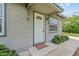 Charming home entrance with decorative door frame and a neatly kept stoop at 1743 Fulton Ave, Clearwater, FL 33755