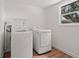Laundry room equipped with a washing machine and dryer at 1743 Fulton Ave, Clearwater, FL 33755
