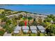 Stunning aerial view of coastal community with manicured lawns near golf course and waterfront at 1813 Bough Ave # B, Clearwater, FL 33760