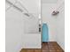 This closet features wire shelving, a mirror and has vinyl flooring at 1813 Bough Ave # B, Clearwater, FL 33760