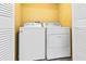 This home includes a laundry room with Whirlpool washer and dryer at 1813 Bough Ave # B, Clearwater, FL 33760