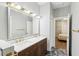 Bathroom featuring a double vanity and luxurious finishes at 19113 Golden Cacoon Pl, Lutz, FL 33558