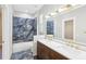 Bathroom featuring a double vanity and luxurious finishes at 19113 Golden Cacoon Pl, Lutz, FL 33558