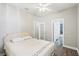 Bedroom with ensuite bathroom and walk-in closet at 19113 Golden Cacoon Pl, Lutz, FL 33558