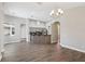 Spacious living room features hardwood flooring and open layout, great for entertaining at 19113 Golden Cacoon Pl, Lutz, FL 33558