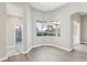 Main bedroom offering a bay window with a pool view and an ensuite bath at 19113 Golden Cacoon Pl, Lutz, FL 33558