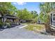 Large backyard with a gazebo, vibrant plants, and a beautifully kept lawn at 2026 Union S St, St Petersburg, FL 33712