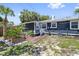 Charming backyard with brick patio, planter boxes, and a well-maintained exterior at 2026 Union S St, St Petersburg, FL 33712