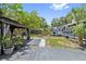 Spacious backyard featuring a cozy gazebo, landscaped areas, and a well-maintained home exterior at 2026 Union S St, St Petersburg, FL 33712