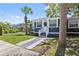Charming home with a well-manicured lawn, modern paint, and inviting front entrance at 2026 Union S St, St Petersburg, FL 33712