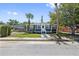 Charming single-story home featuring a well-manicured lawn and inviting front porch at 2026 Union S St, St Petersburg, FL 33712