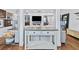 Open-concept layout showcasing a living room with wood floors and seamless flow to adjacent spaces at 2026 Union S St, St Petersburg, FL 33712