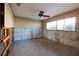 Spacious living room with tile floors and a ceiling fan to be updated at 208 Bath Club N Blvd, North Redington Beach, FL 33708
