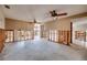 Expansive open living area with water views; ideal for renovation with exposed framing at 208 Bath Club N Blvd, North Redington Beach, FL 33708