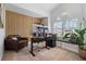 Stylish home office featuring a modern desk, comfortable seating, natural light, and a minimalist design at 2182 Trevor Rd, Palm Harbor, FL 34683