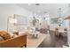 Bright living room featuring hardwood floors and modern décor for a welcoming, stylish atmosphere at 2182 Trevor Rd, Palm Harbor, FL 34683