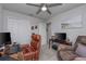 Functional home office featuring comfortable seating, a large desk, and ample workspace at 2507 Arbor Wind Dr, Lutz, FL 33558