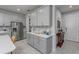 Bright kitchen with gray cabinets, stainless appliances, and spacious countertops at 2507 Arbor Wind Dr, Lutz, FL 33558