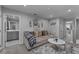 Cozy living room area with a comfortable sofa, modern decor, and access to the bathroom at 2507 Arbor Wind Dr, Lutz, FL 33558