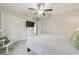 Spacious bedroom featuring a ceiling fan and closet at 28568 Tranquil Lake Cir, Wesley Chapel, FL 33543
