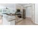 Well-equipped kitchen features stainless steel appliances and granite countertops at 321 Barbara Cir, Belleair, FL 33756