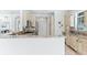 Stylish kitchen with granite counters, breakfast bar, and stainless steel appliances at 321 Barbara Cir, Belleair, FL 33756