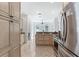 Bright kitchen featuring stainless steel appliances and an open layout design at 321 Barbara Cir, Belleair, FL 33756