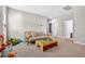 Spacious bonus room with neutral walls, carpet flooring, and ample natural light great for relaxing or entertaining at 33854 Floating Heart Ct, Wesley Chapel, FL 33545
