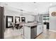 Spacious kitchen featuring island, stainless appliances and open to dining at 33854 Floating Heart Ct, Wesley Chapel, FL 33545