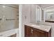 Bathroom featuring vanity with stone counter and walk-in shower at 3902 Shoreside Cir, Tampa, FL 33624