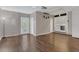 Bright laundry room with hardwood floors and exterior access at 3902 Shoreside Cir, Tampa, FL 33624