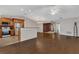 Spacious living room with hardwood floors leading to kitchen and hallway at 3902 Shoreside Cir, Tampa, FL 33624