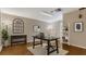 Home office setup with desk, shelving and natural light at 3902 Shoreside Cir, Tampa, FL 33624